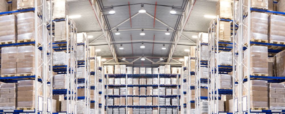 Warehouse with circular high bay luminaires